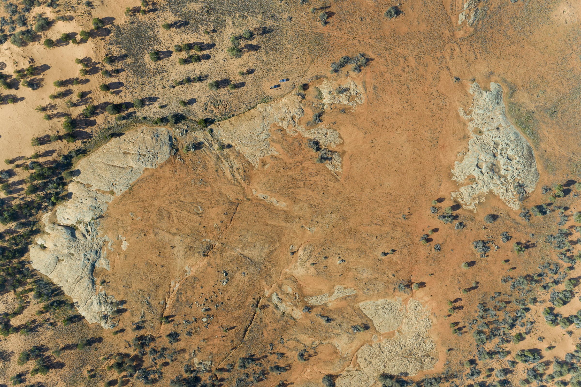 Aerial view of ochre earth, rock formations and native vegetation in South Australia